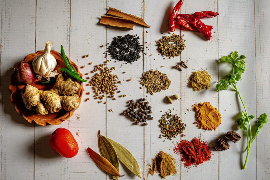 photograph of Indian spices and herbs on a table